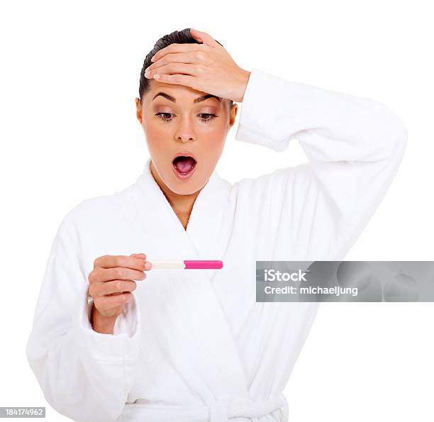 Shocked Woman In Bathrobe With Pregnancy Test Stock Photo - Download Image Now - Adult, Adults Only, Bathrobe