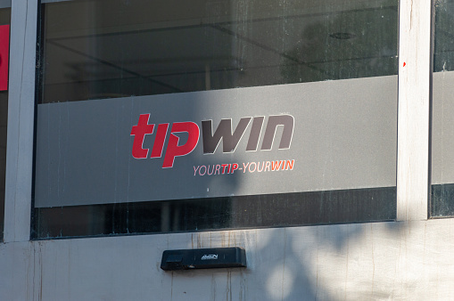 Hanau, Germany - June 25, 2023: Logo and sign of tipwin betting company.