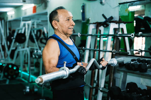 istock Elderly person exercising in gym 1841793488