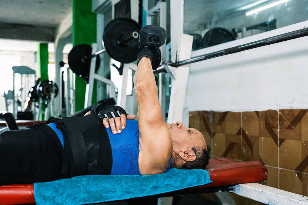 Elderly person exercising in gym