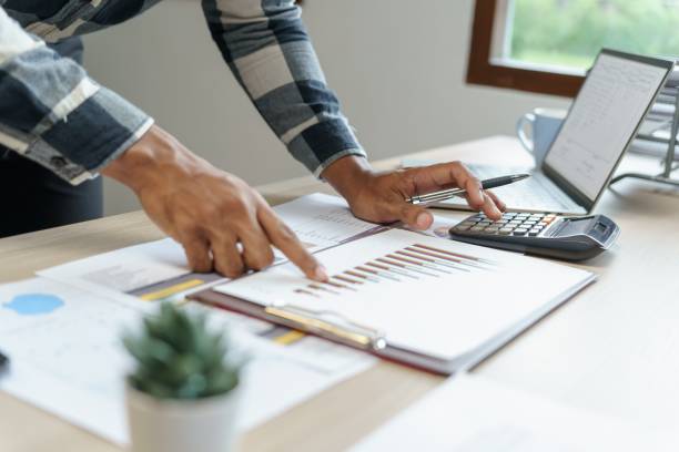 istock Attractive confident Hispanic Business man using laptop computer and professional working investor start up project business planning in office 1841822389