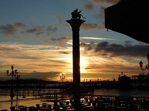 istock Venice Sunset over Winged Lion of St. Mark 184187104