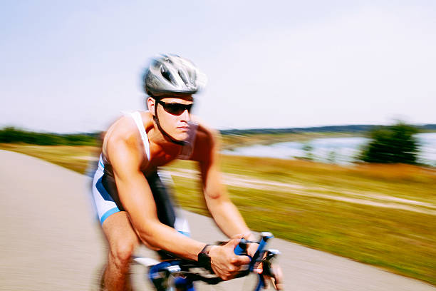 istock Triathlete cycling on a bicycle 184188463
