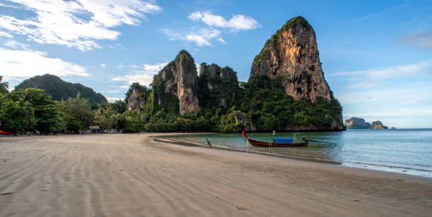 istock Thai long boat and blue Andaman Sea 1841905768