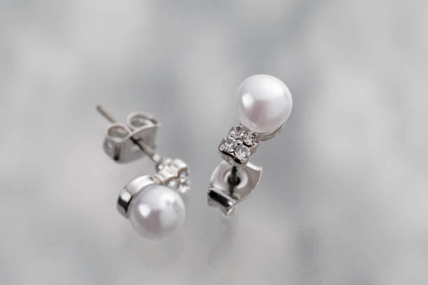 Metal frame with hanging earrings