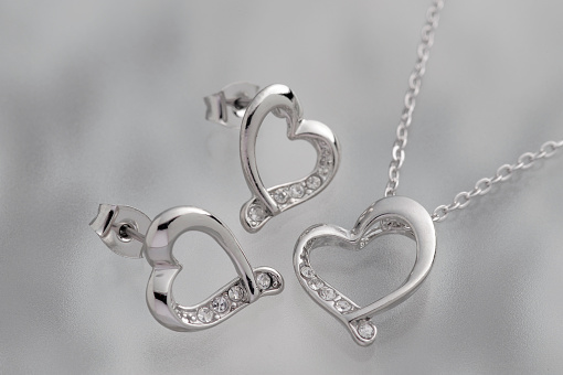 Heart necklace and earrings with diamonds