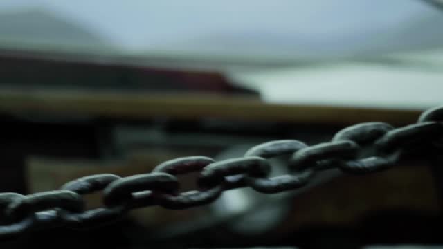 Boat chain with sea behind. stock video