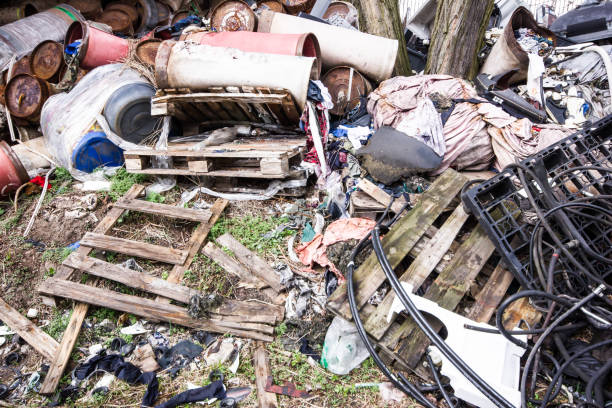 istock Abandoned garbage dump. Junkyard texture. Pile of various trash backdrop. Environment destruction with rubbish and trash. 1841937309