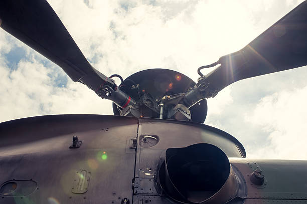 istock Rotor on military helicopter with sunlight in background 184196263