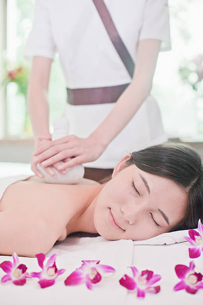 istock Women Receiving Herbal Massage 184201622
