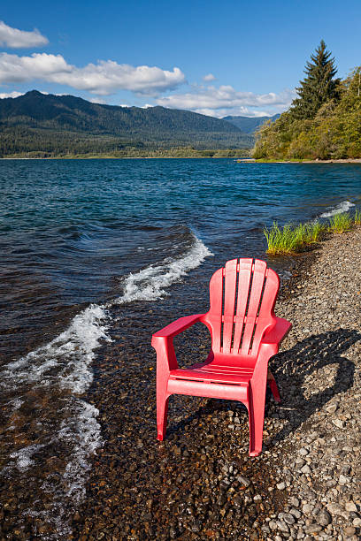 istock Adirondack Chair by Lake 184205084