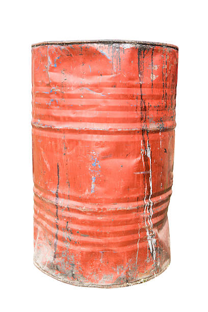 istock Red dirty rusty and damaged oil drum 184210319