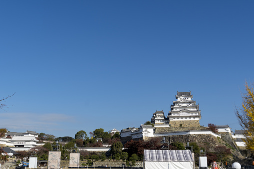 Himeji, Hyogo, Japan - Nov 22 2023 : View of Himeji Castle from Sannomaru square of Himeji Park, Long Shot