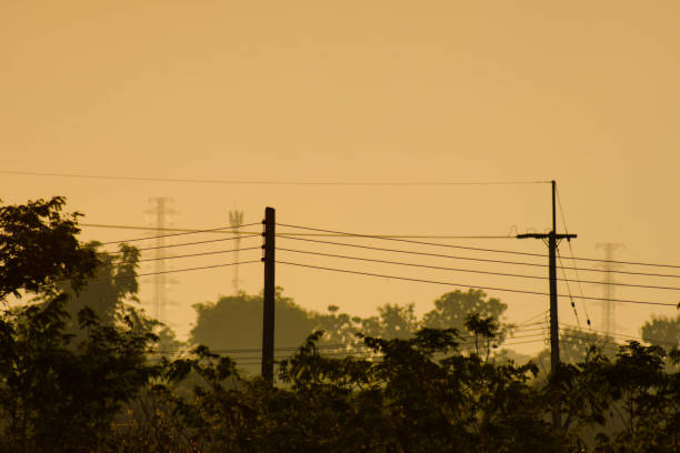 istock Two electric poles in evening sky. 1842114204