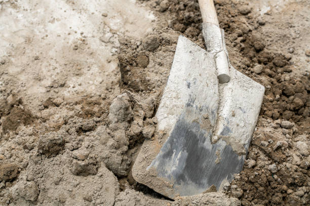 istock The shovel is stuck in the soil. Construction Site 1842145385