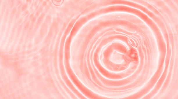 istock Water texture surface in Peach Tone,Summer Background Transparent Pure Water Waves Pattern with Bubbles,Ripples,Splashes in Sunlight,Top view Backdrop Banner for Spring Cosmetics moisturizer,Spa 1842150238