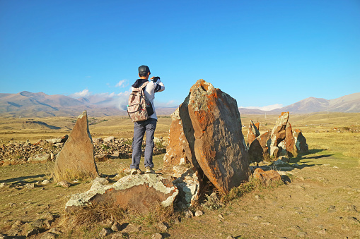 Visitor at Carahunge, Often Called Armenian Stonehenge, a Prehistoric Archaeological Site in Syunik Province of Armenia