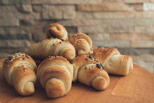 Buns on a wooden table. Delicious homemade pastry.