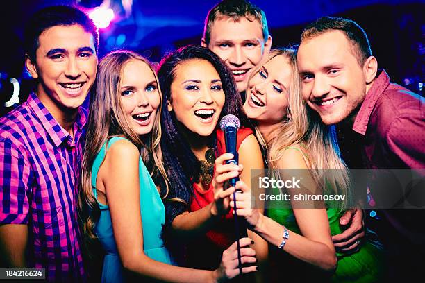 Singing Together Stock Photo - Download Image Now - Karaoke, Adult, Adults Only