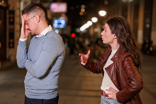Boyfriend and Girlfriend Express Their Discontent on the Night Streets
