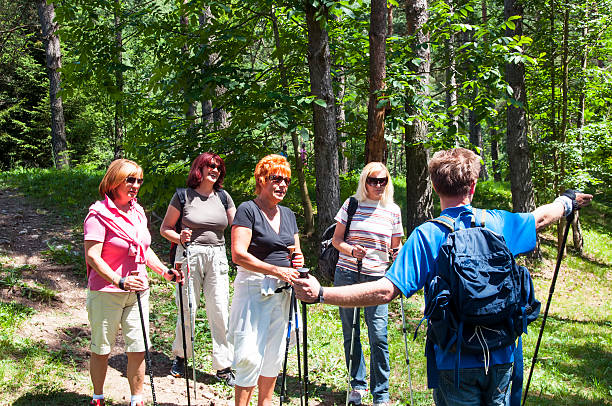 istock Nordic walking in park 184218823