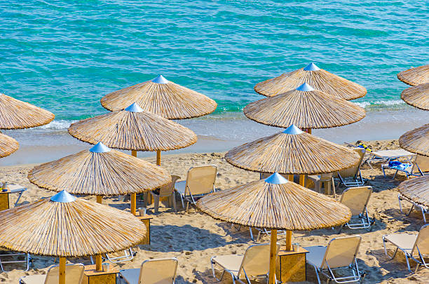 istock Straw umbrellas and sandy beach Kalamaki at Zakynthos 184221386
