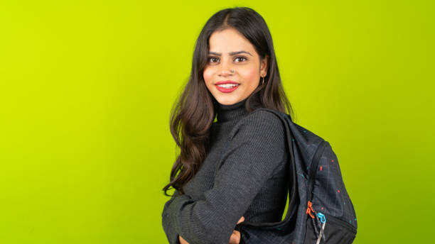 istock Young Indian student woman wearing backpack over isolated green screen chroma key background 1842248249