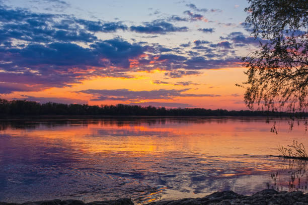 istock Sunset landscape over a wide river 1842269725