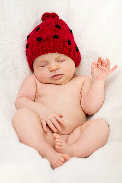 istock Baby girl with a ladybug hat 184228612