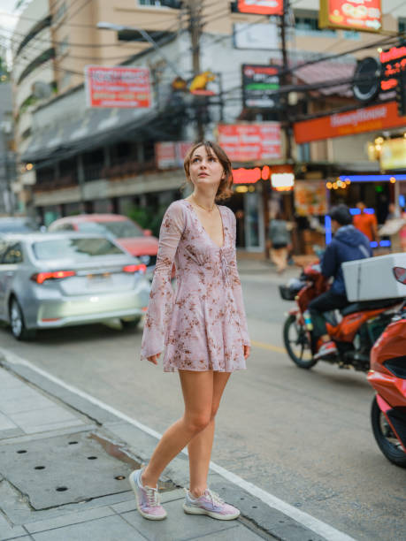 istock Woman walking in Bangkok downtown 1842292892