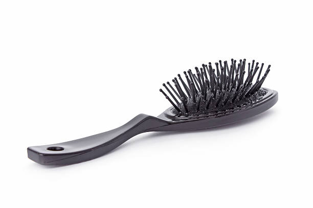 istock Black hairbrush isolated on white 184230081