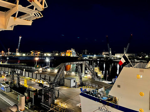 Ships and cranes at Portsmouth Harbour at night