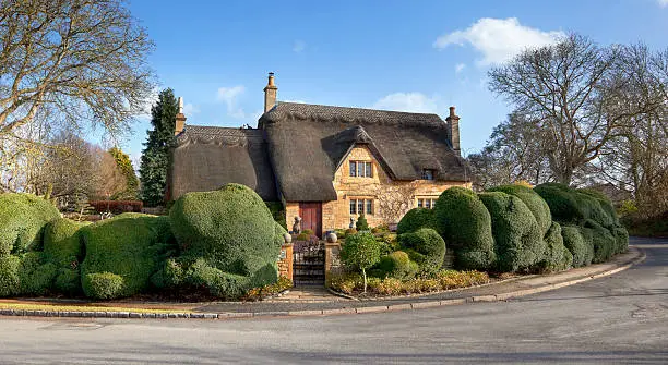 Beautiful Cotswold, honey-coloured, thatched cottage, Chipping Campden, Gloucestershire, England.