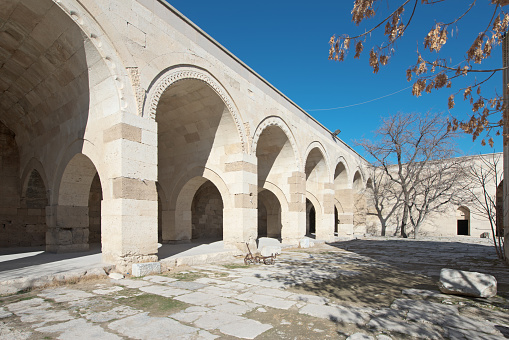 Wide interior view of the inside of the caravanserai, where wandering merchants could find safety at night while travelling on the ancient Silk Road