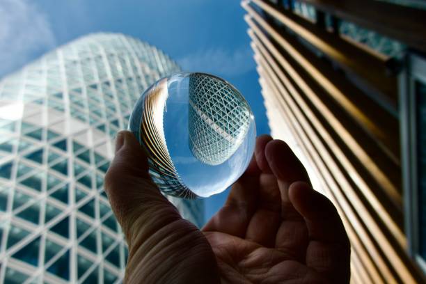 istock Crystal ball against skyscrapers 1842342889