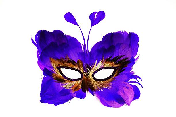 Mask of a butterfly for holidays and carnivals Mask of a butterfly on a human face, from feathers of blue color, for holidays and the carnivals, isolated on a white background butterfly purple blue isolated stock pictures, royalty-free photos & images