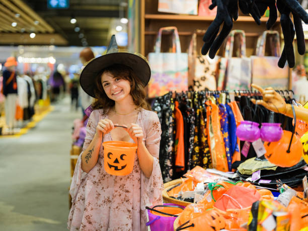 istock Cheerful woman shopping for  Halloween 1842353899