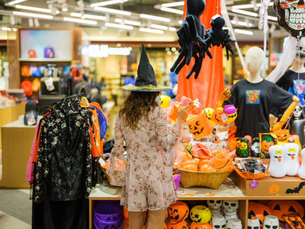 istock Cheerful woman shopping for  Halloween 1842356496