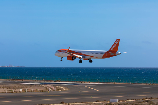 Aiplane easyjet on the runway after landing, taxiing to the terminal at the airport César Manrique-Lanzarote. November 09, 2023. Arrecife, Canary Island, Spain Arrecife, Canary Island, Spain