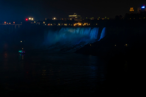 Light show in Niagara Falls at night.