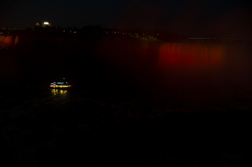 Light show in Niagara Falls at night.