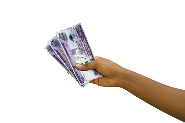istock Fair hand holding 3D rendered Ethiopian birr notes isolated on white background 1842406287