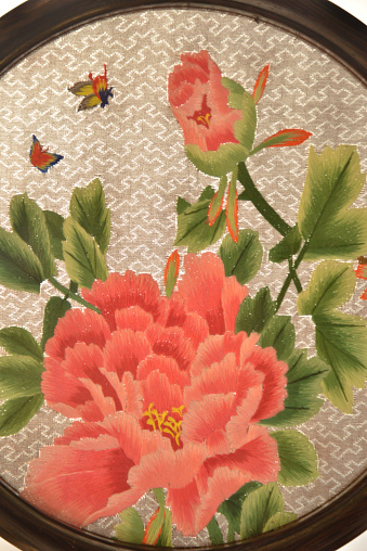 Part of Chinese embroidery works，peony flowers and butterfly  on display