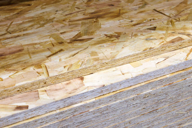 istock stacks of tongue and groove OSB compressed sawdust sheets 1842572232