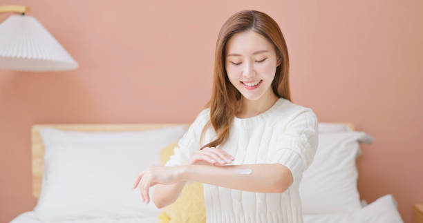 istock asian female fall skincare arm 1842572277
