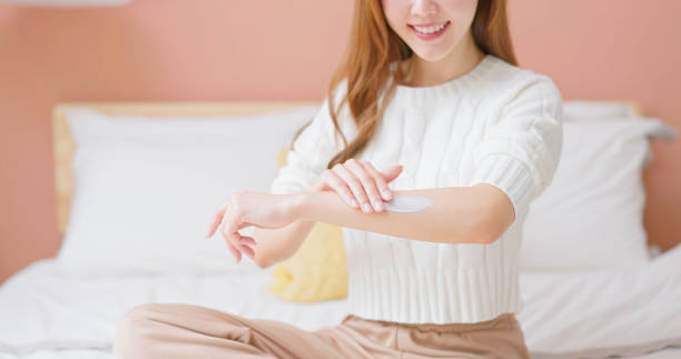 istock asian female fall skincare arm 1842572314