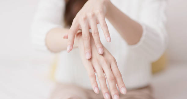 istock asian female skincare hand 1842575027