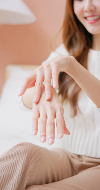 istock asian female skincare hand 1842575075