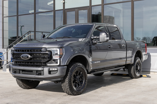 Indianapolis - December 7, 2023: Used Ford F-250 display at a dealership. With supply issues, Ford is relying on pre-owned car sales to meet demand.