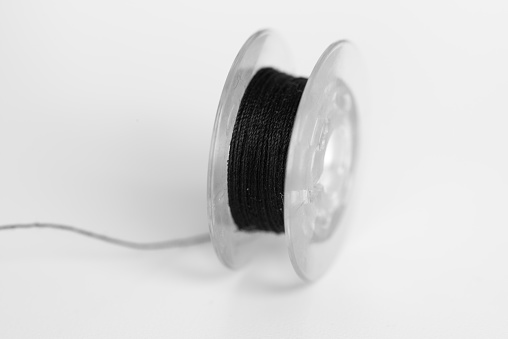 Plastic thread spool.